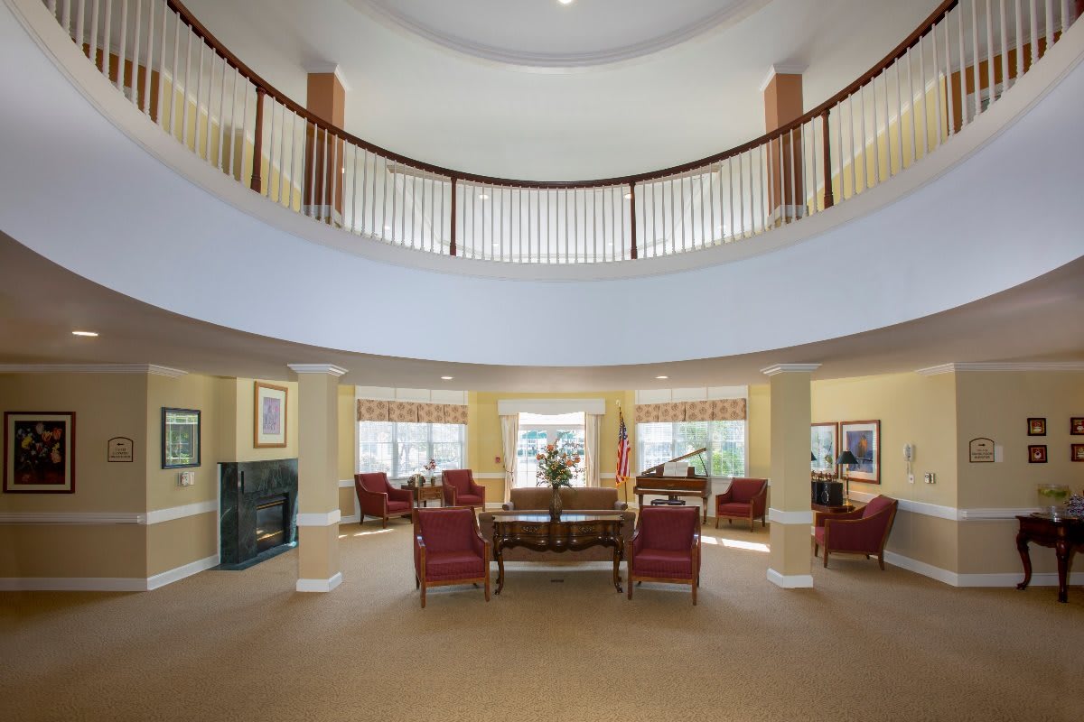 A spacious lobby area with elegant seating and architectural design.