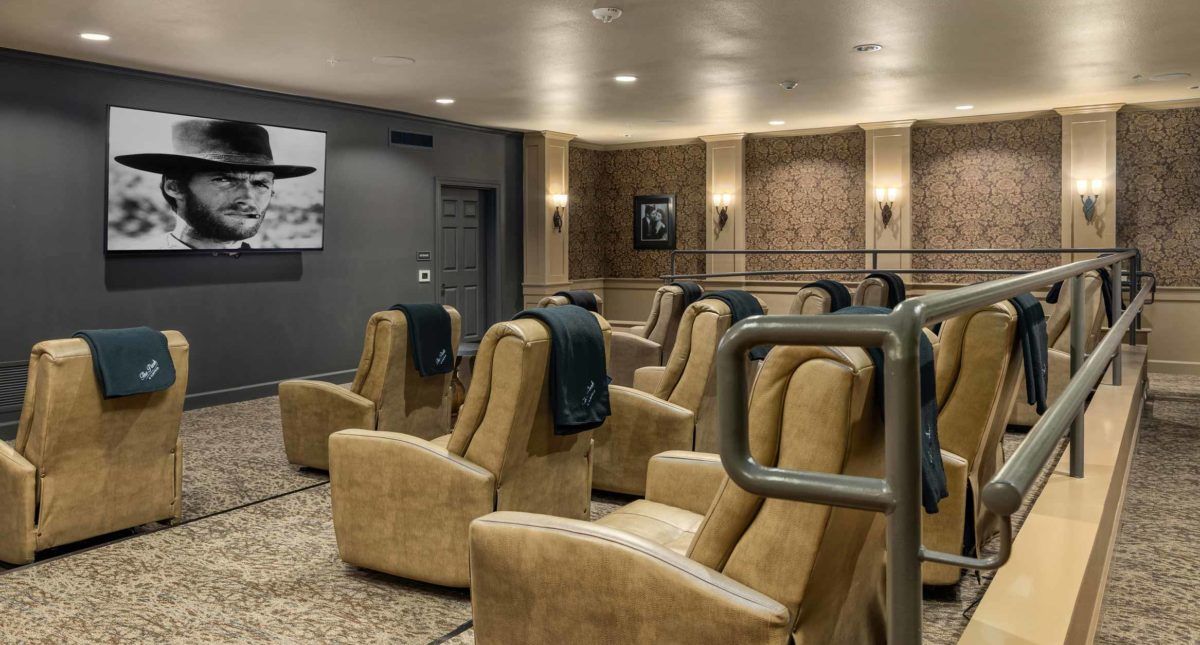 A cozy room with comfortable seating, possibly for a cinema or relaxation area.