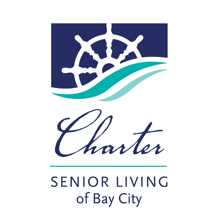 Logo of Charter Senior Living of Bay City featuring a sailing wheel and waves.