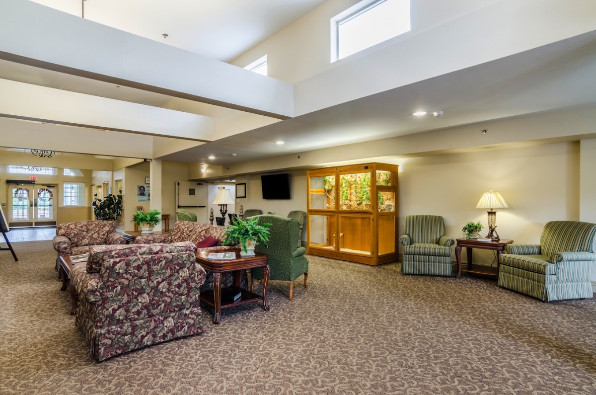 A cozy living room area with comfortable seating and tasteful decor.