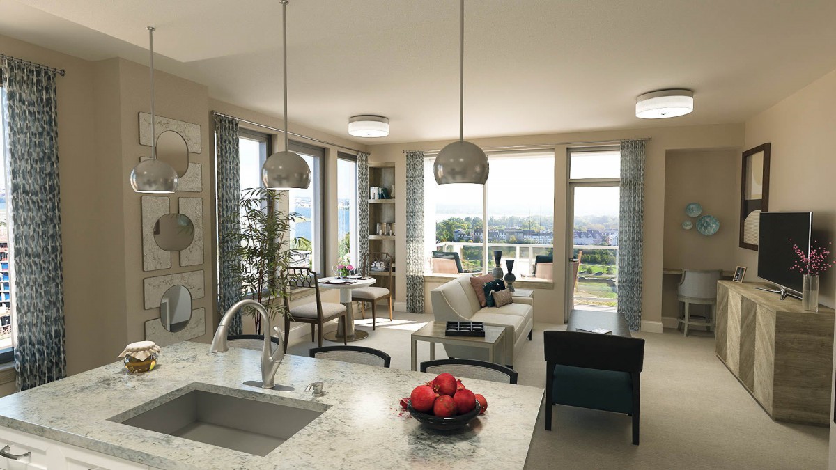 A modern open-plan kitchen and living room with large windows, allowing natural light to fill the space.