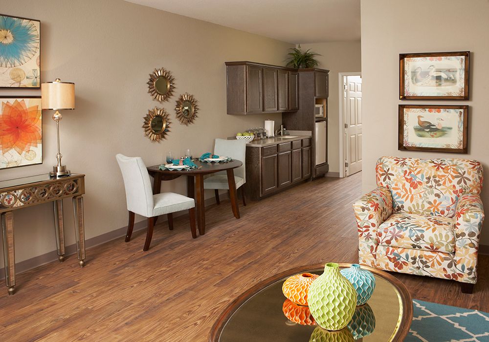A cozy living space with a dining area and modern decor.