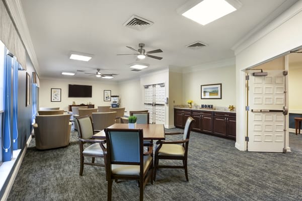 A spacious living area with comfortable seating and modern furnishings.