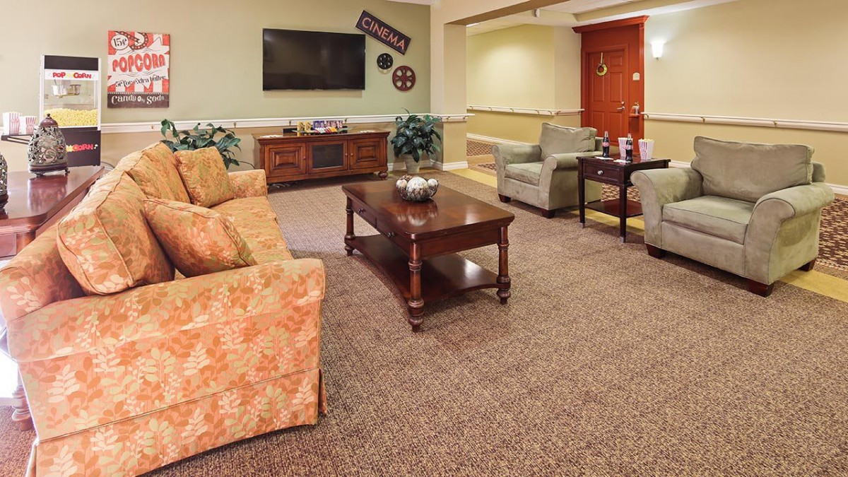A cozy living room with comfortable seating and a television.