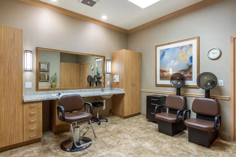 A well-organized beauty salon with styling stations and chairs.