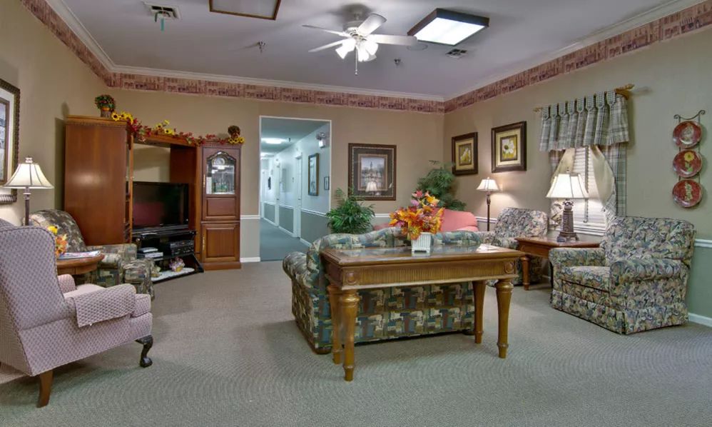 A cozy living room with comfortable seating and elegant decor.