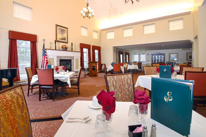 An elegant dining room with neatly arranged tables and a refined atmosphere.