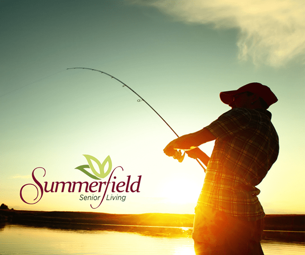 A person enjoys fishing at sunset, embodying the leisurely lifestyle promoted by Summerfield Senior Living.