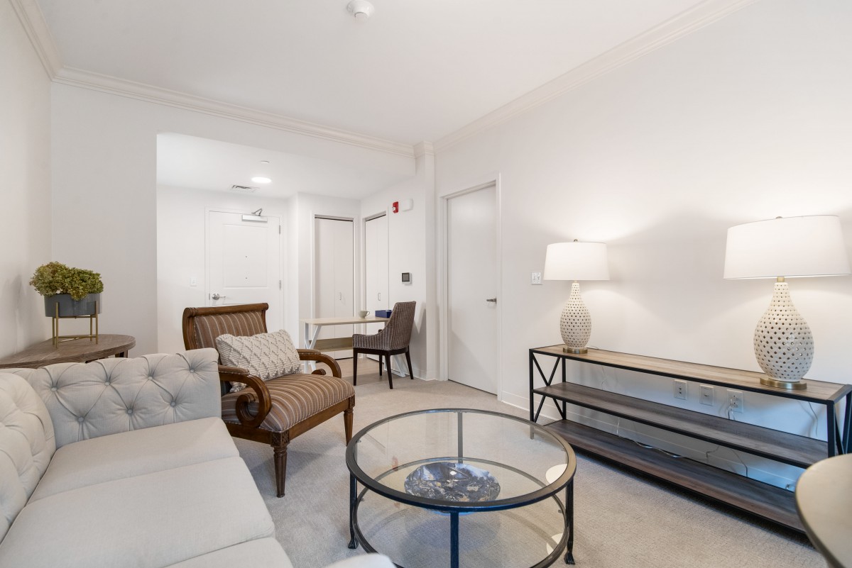 A cozy living room with comfortable seating and modern decor.