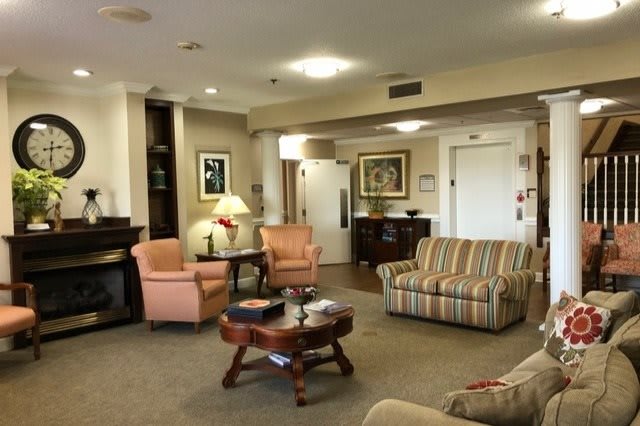 A cozy living room with comfortable seating and warm decor.