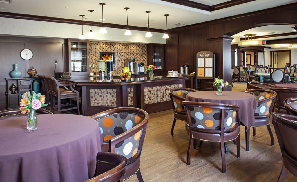 A modern cafe interior with stylish decor and comfortable seating.