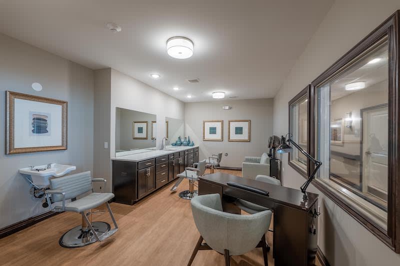 A modern interior room with stylish furniture and decor elements.