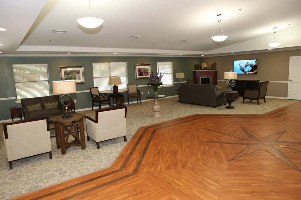 Spacious living room with comfortable seating and elegant decor.