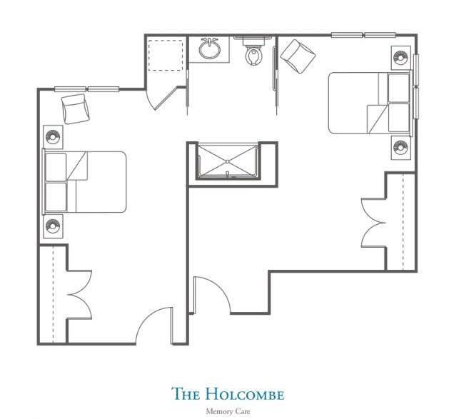 Blueprint of a two-room layout with furnishings.