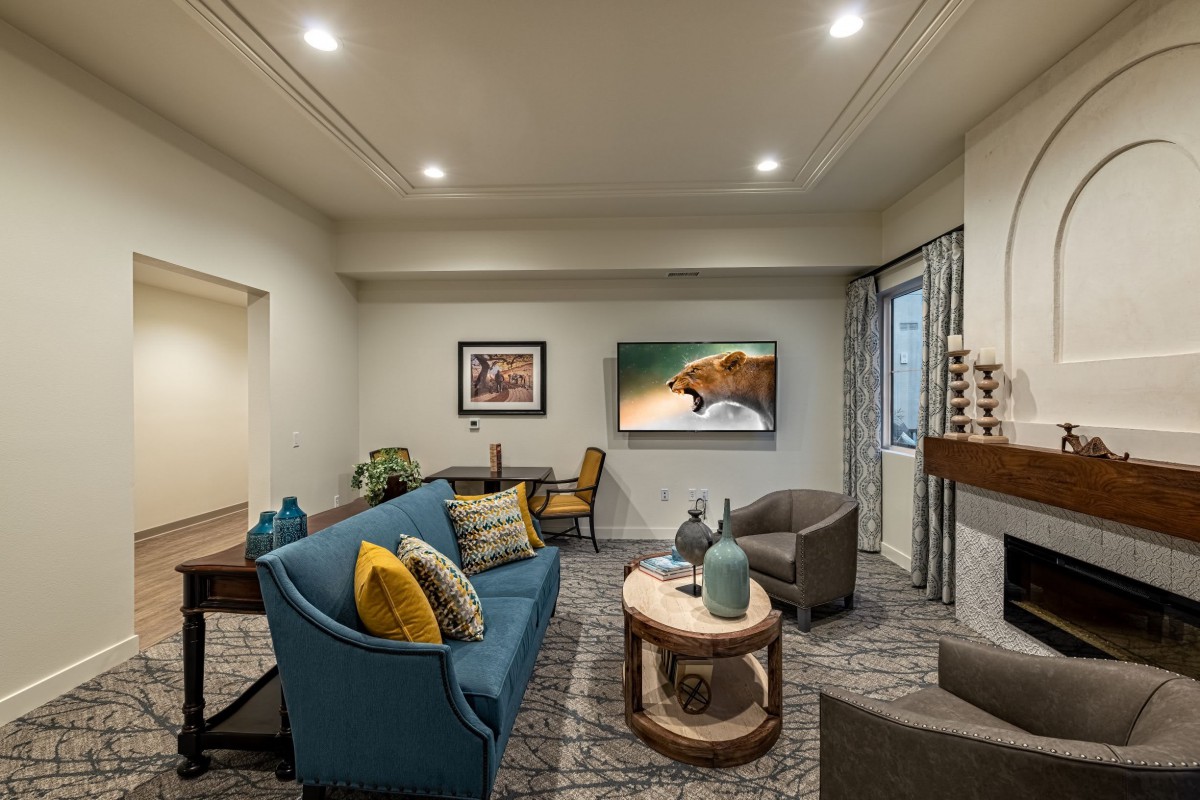 A cozy living room with modern furniture and decor.