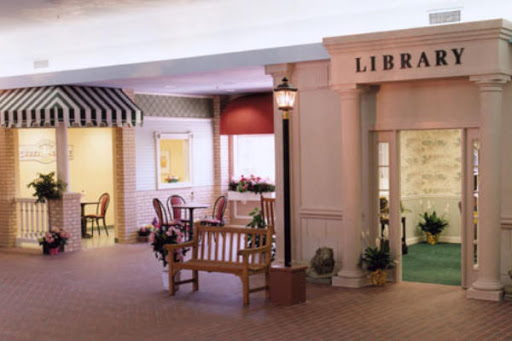 A cozy library area featuring comfortable seating and inviting decor.