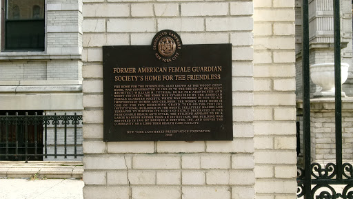 A historical plaque commemorating the contributions of the Female Guardians Society in New York.