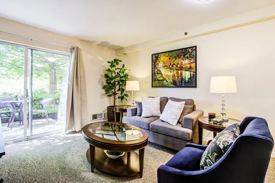 A cozy living room with modern furniture and decor.