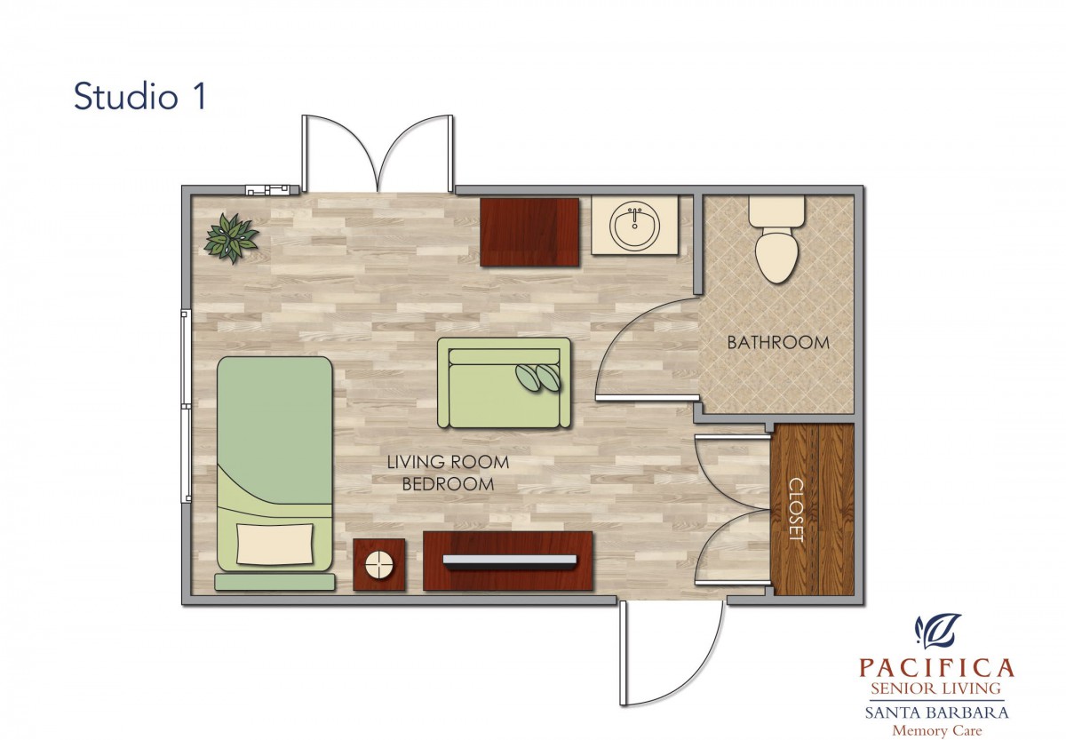 A floor plan depicting a single room with an attached bathroom, including furniture arrangement.