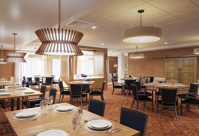 An elegantly designed restaurant dining room with neatly arranged tables and modern lighting.