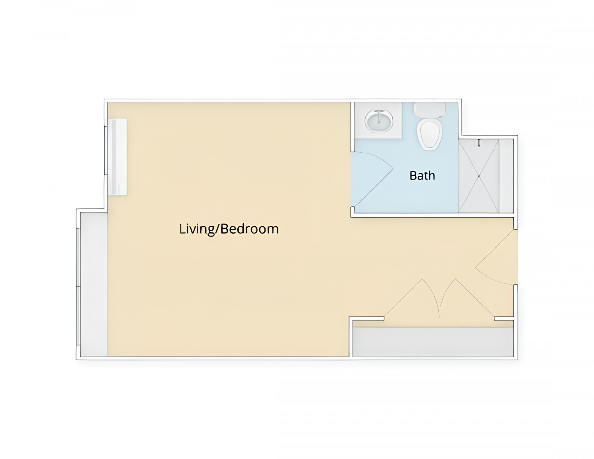 A floor plan of a studio apartment featuring a combined living and bedroom area with an adjacent bathroom.
