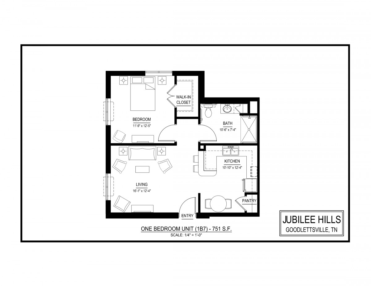 A floor plan of a one-bedroom apartment with labeled rooms and dimensions.
