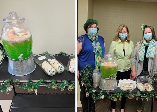 A festive gathering featuring green punch and treats, with attendees wearing masks.