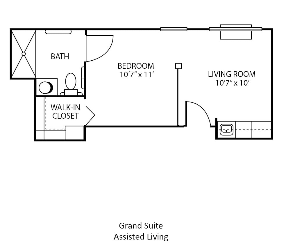 Floor plan of a Grand Suite for assisted living, featuring a bedroom, bathroom, living room, and walk-in closet.