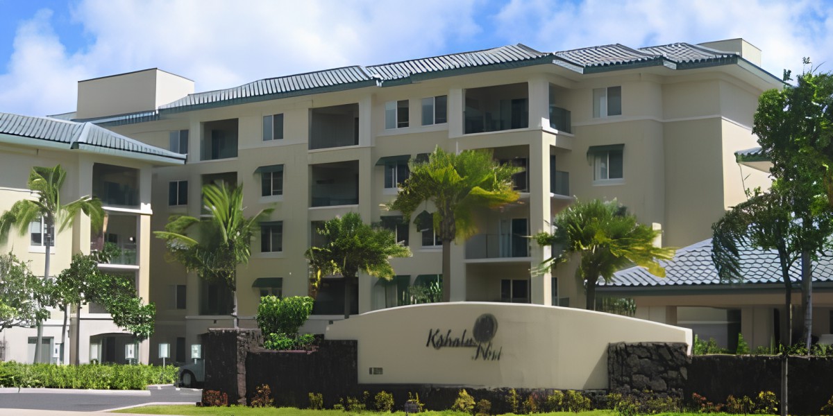 A modern apartment building surrounded by palm trees.