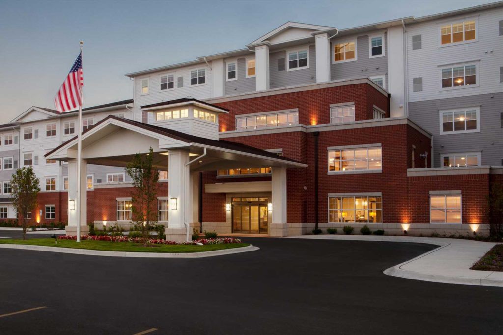 An exterior view of a hotel with a welcoming entrance.