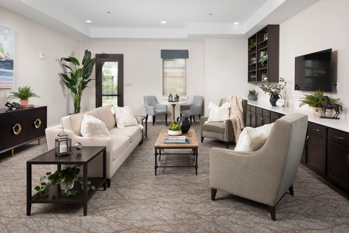 A modern living room with stylish furniture and decor.