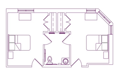 A schematic floor plan showing a bathroom layout with a toilet and a washing machine.