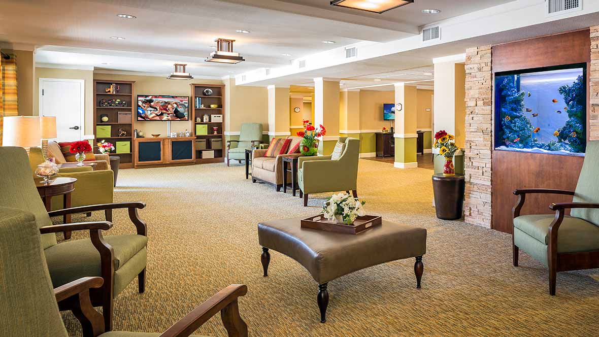 A well-lit lobby with comfortable seating and elegant decor.