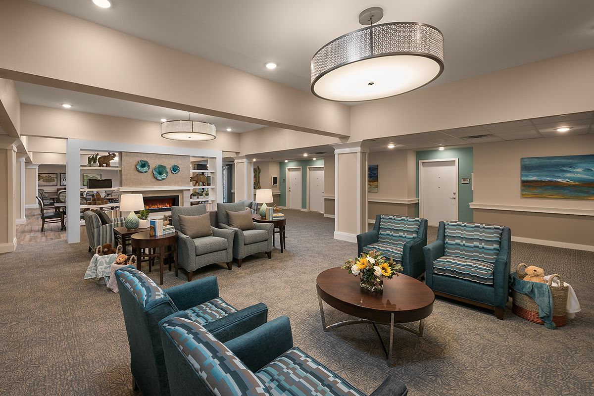 A modern lobby area featuring comfortable seating and elegant lighting.
