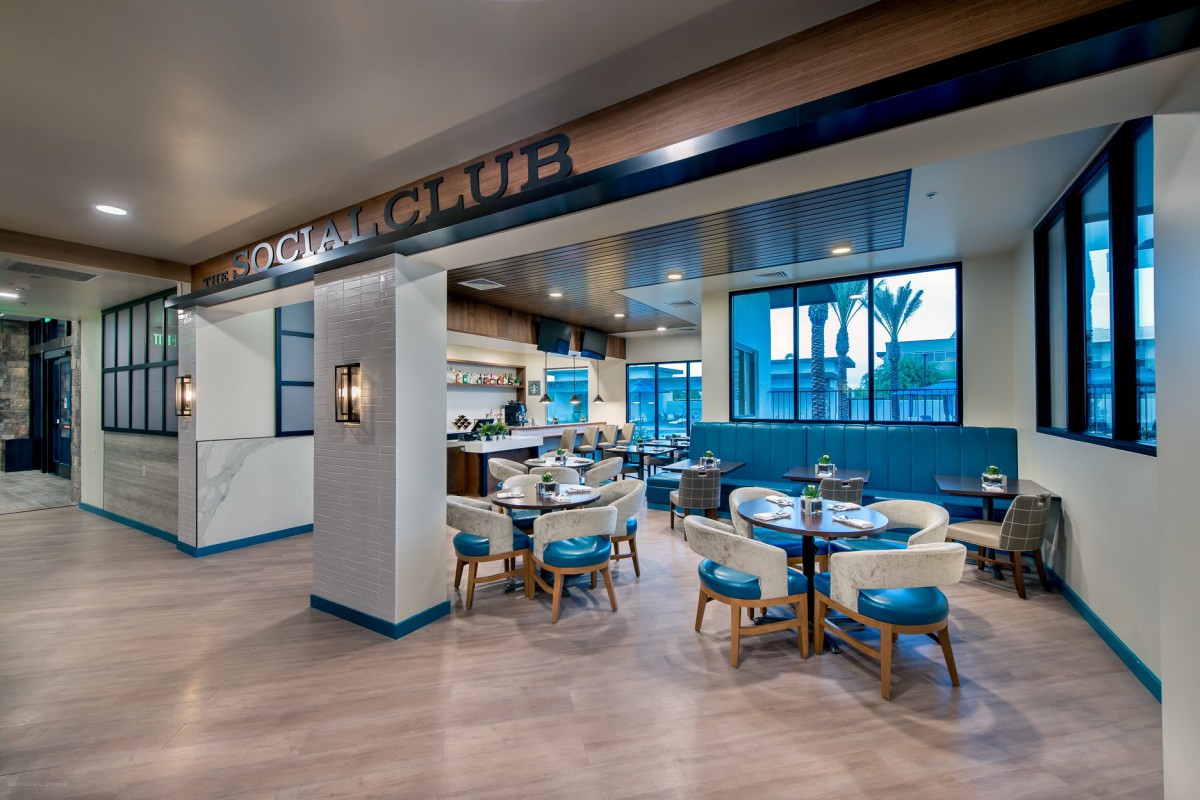 A modern restaurant interior with stylish seating and decor.