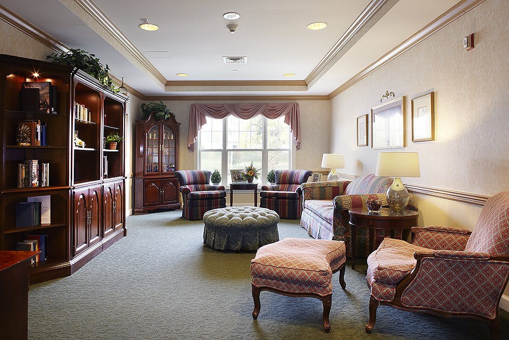 A traditionally styled living room with elegant furniture and decor.
