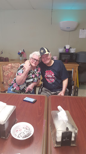 A joyful moment shared between two friends, enjoying each other's company.