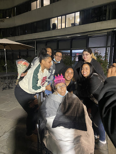 A joyful group of friends celebrating together at night.