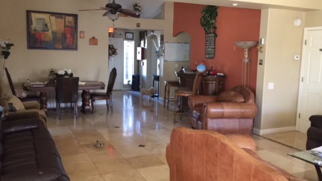 Spacious living room with a dining area and cozy seating.