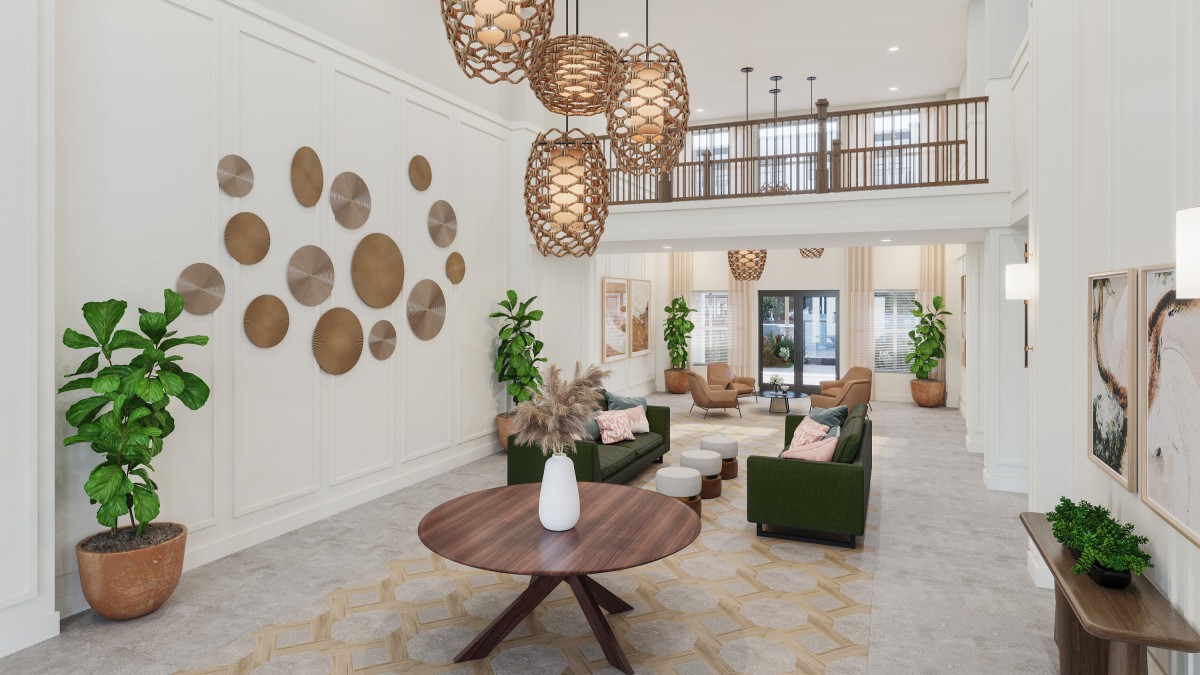 A modern lobby with stylish furniture and decorative lighting.