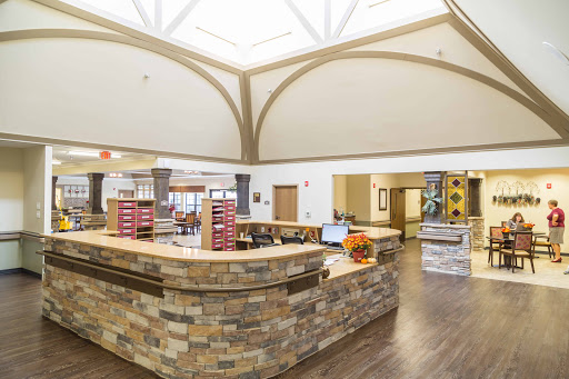 A welcoming reception area featuring a blend of modern and natural elements.