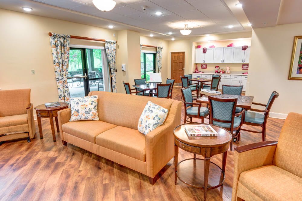A cozy living and dining area with comfortable seating and modern decor.