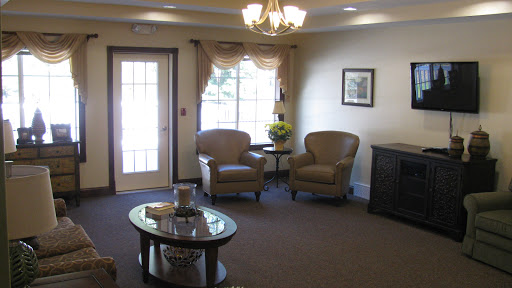 A cozy waiting room with comfortable chairs and a welcoming atmosphere.