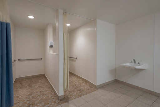 A clean and modern restroom with accessible features.