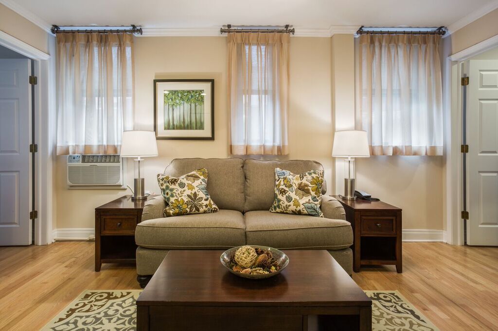 Cozy living room with a comfortable sofa and elegant decor.