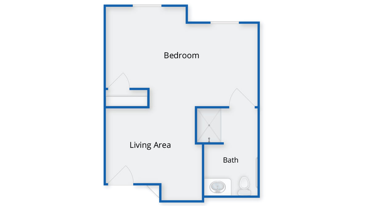 A simple floor plan showing a layout with a bedroom, living area, and bathroom.
