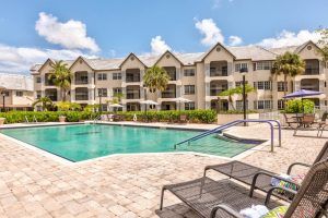 A sunny day by the pool at an apartment complex.
