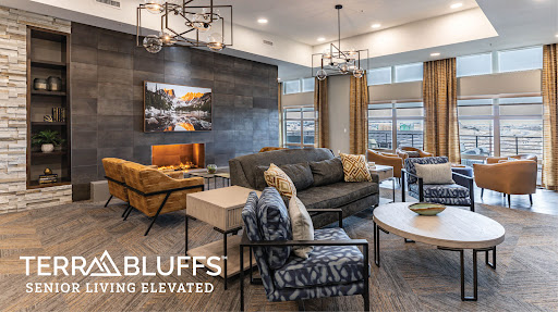 A contemporary living space featuring stylish furniture and elegant lighting.