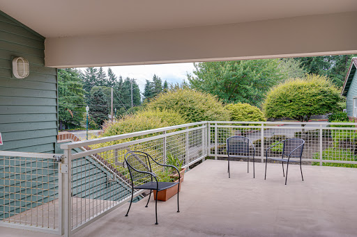 A peaceful balcony view surrounded by lush greenery, perfect for relaxing.