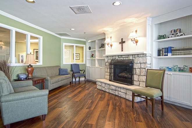Cozy living room with a fireplace and comfortable seating.
